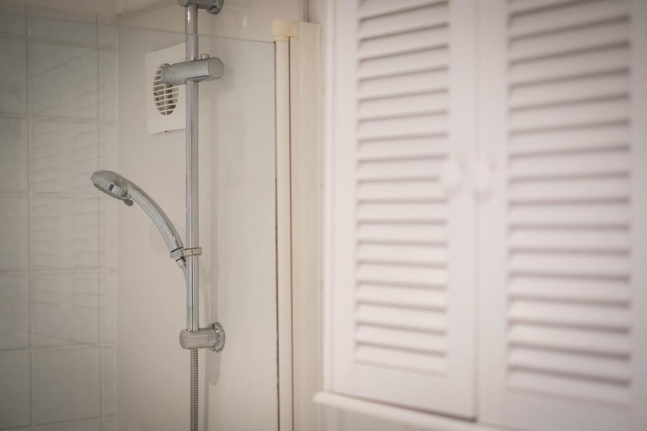 En suite walk-in shower at Glen Wynne Guest House