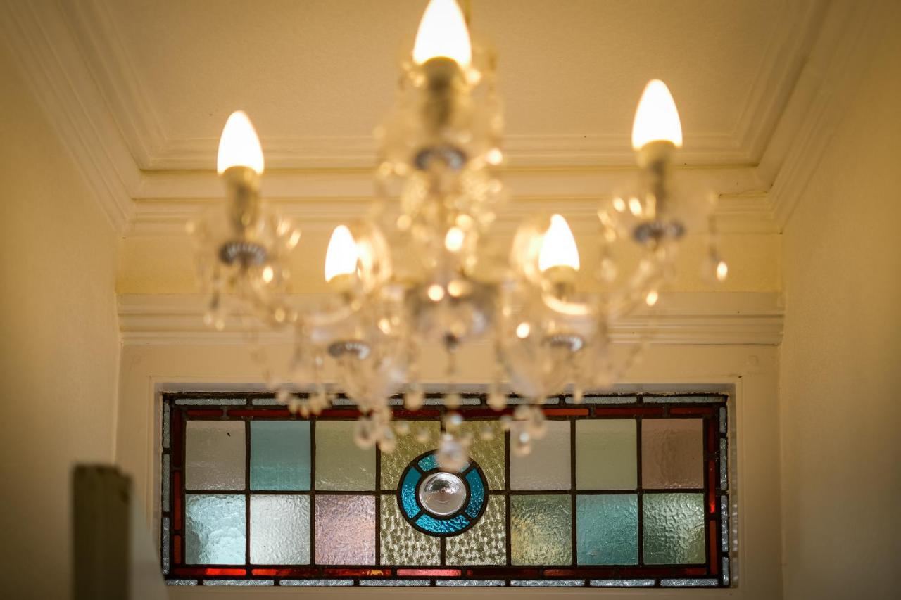 Chandelier and stained glass at Glen Wynne Guest House